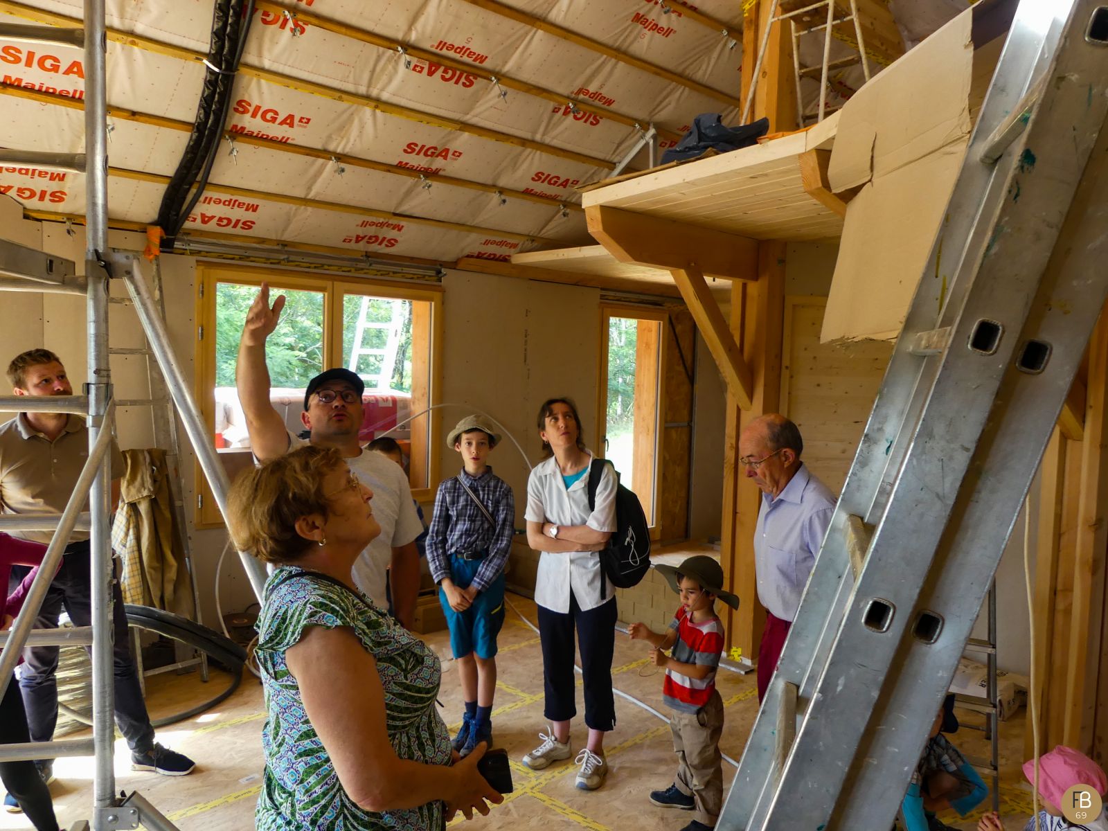 Visite de chantier d'une maison en bois